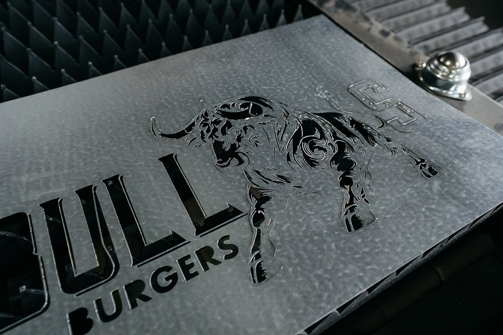 Laser-cut steel sign plate detail